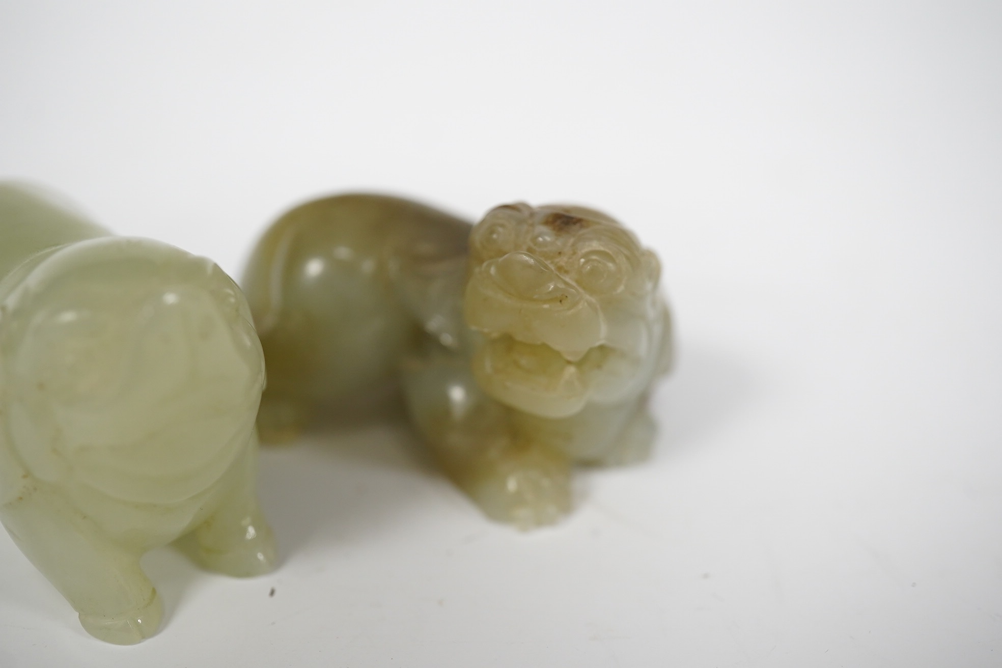 Two Chinese jade figures of animals including a pig, largest 5.5cm wide (2). Condition - good